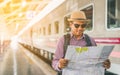 Young traveler man at platform train station. Traveling concept Royalty Free Stock Photo