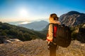 Young traveler photographer on the mountain Royalty Free Stock Photo