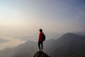 Young traveler standing and looking at beautiful landscape Royalty Free Stock Photo