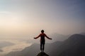 Young traveler standing and looking at beautiful landscape Royalty Free Stock Photo