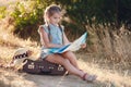 A young traveler was exploring the map of the area Royalty Free Stock Photo