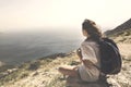 Traveler woman looking and meditating the spectacular view