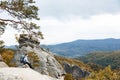 Young Traveller Sitting Alone Around The Rocks