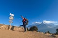 Young traveller trekking in Poon Hill view point in Ghorepani, Nepal