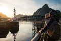 Young travellers in Reine village, Norway Royalty Free Stock Photo