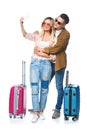 young travelling couple with suitcases taking selfie with smartphone Royalty Free Stock Photo