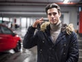 Confident man on parking setting car alarm Royalty Free Stock Photo