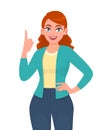 Young trendy woman pointing finger up. Happy stylish girl showing index finger. Female character illustration design. New idea. Royalty Free Stock Photo