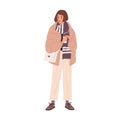 Young trendy woman in warm winter or autumn clothes. Seasonal fashion. Modern female character in down jacket, pants