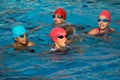 Young triathletes in the water.