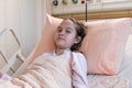 Young tween girl in hospital bed Royalty Free Stock Photo