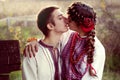 Young Ukrainian couple in traditional clothes