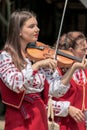 Young Ukrainian girl violin singer from Banat, in traditional co