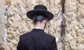 Young ultra-orthodox jewish man pray at the Western Wall. Jerusalem