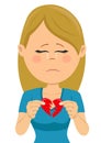 Young unhappy sad woman with a broken heart card Royalty Free Stock Photo