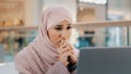 Young upset arab woman receiving email reads bad news on laptop letter with refusal health problems Bank notice for loan Royalty Free Stock Photo