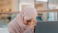 Young upset arab woman receiving email reads bad news on laptop letter with refusal health problems Bank notice for loan Royalty Free Stock Photo