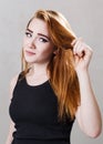 Upset woman with dry damaged hair. Royalty Free Stock Photo