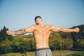 Young urban athlete warming up before calisthenics training Royalty Free Stock Photo