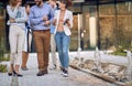 Young, urban group of bussinespeople walking Royalty Free Stock Photo