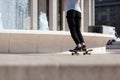 ZAGREB, GRAD ZAGREB / CROATIA - 04/16/2019:Young urban skateboarder skating in front of fountain and Mestrovic Pavilion