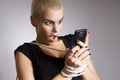 Young urban woman addicted to smart phone metaphor