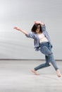 Young urban woman dancing. Royalty Free Stock Photo
