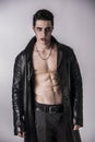 Young Vampire Man in an Open Black Leather Jacket Royalty Free Stock Photo