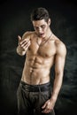 Young Vampire Man Shirtless, Gesturing to Camera