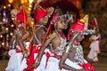 Young Ves Dancers, otherwise known as Up Country Dancers wait for the commencement of the Esala Perahera in Kandy in Sri Lanka.