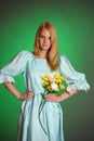 Young Victorian Lady with yellow flowers in hand