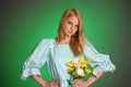 Young Victorian Lady with yellow flowers in hand