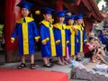 Young Vietnamese kids having their graduation ceremony Royalty Free Stock Photo