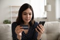 Young Asian woman pay online with credit card Royalty Free Stock Photo