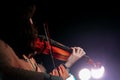 Young Violinist Girl Performance with Her Violin iNstrument on the indoor Concert Stage Royalty Free Stock Photo