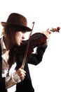 Young violinist playing the violin in hat a