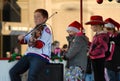 Young violinist at Santa Clause Parade