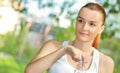 Young vitaly blond woman holding drinking water Royalty Free Stock Photo