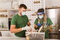 Volunteers group packing food and drinks for charity Royalty Free Stock Photo