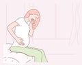 Young vomiting woman sitting on bed. Pregnant blonde suffering with nausea.Eps10 