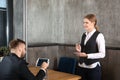 Young waitress taking an order from man in restaurant Royalty Free Stock Photo