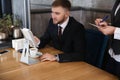 Young waitress taking an order from man in restaurant Royalty Free Stock Photo