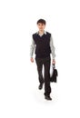 The young walking businessman isolated on a white Royalty Free Stock Photo