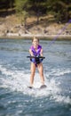 Young Waterskier on a beautiful scenic lake