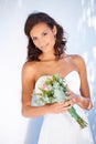 Young, wedding and bouquet with portrait of woman at venue for love, celebration and engagement. Ceremony, reception and Royalty Free Stock Photo