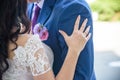 Young wedding couple enjoying romantic moments outside on a summer meadow Royalty Free Stock Photo