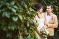 Young wedding couple enjoying romantic moments outside