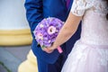 Young wedding couple enjoying romantic moments outside on a summer meadow Royalty Free Stock Photo