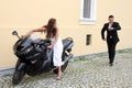 Young wedding couple with motorbike Royalty Free Stock Photo