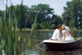 Young wedding couple sailing on the boat Royalty Free Stock Photo